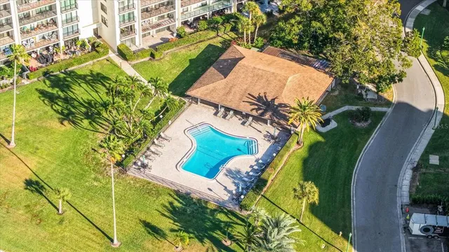 a view of swimming pool with outdoor seating
