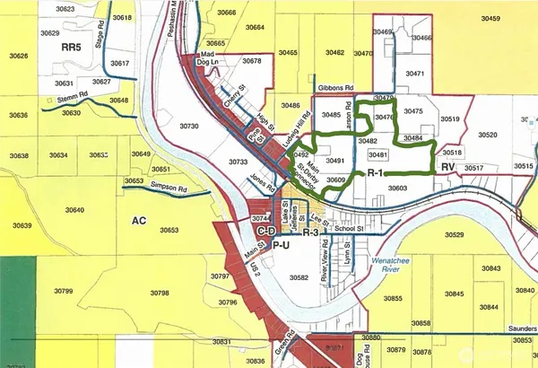 a view of a swimming pool with a large window and potted plants