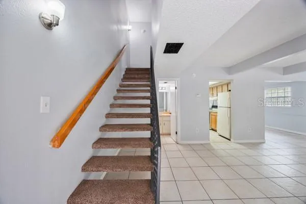 a view of entryway and hall with a window
