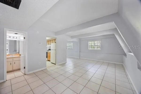 a picture of a bathroom with a shower