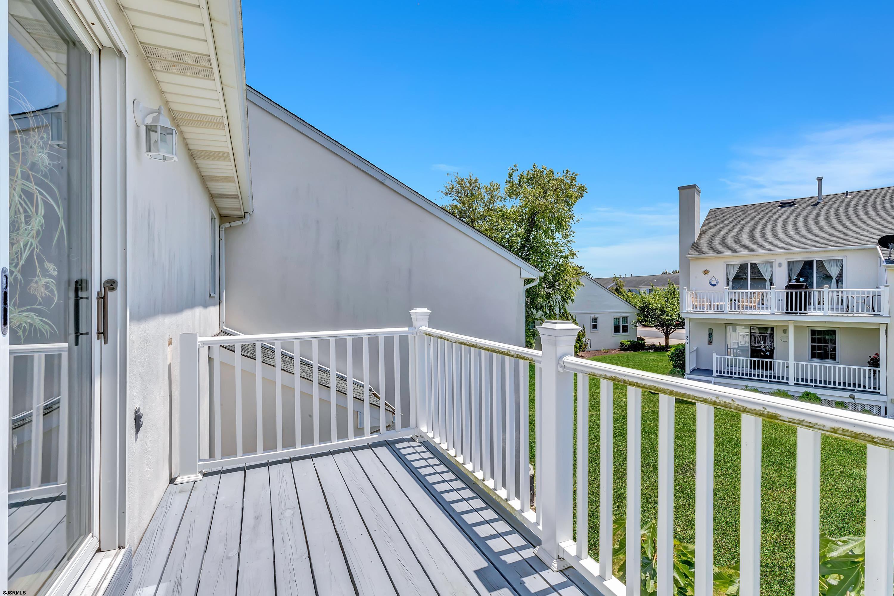 316 Gull Cove Brigantine, NJ 08203 - Photo 20 of 32 a view of a houses with a balcony