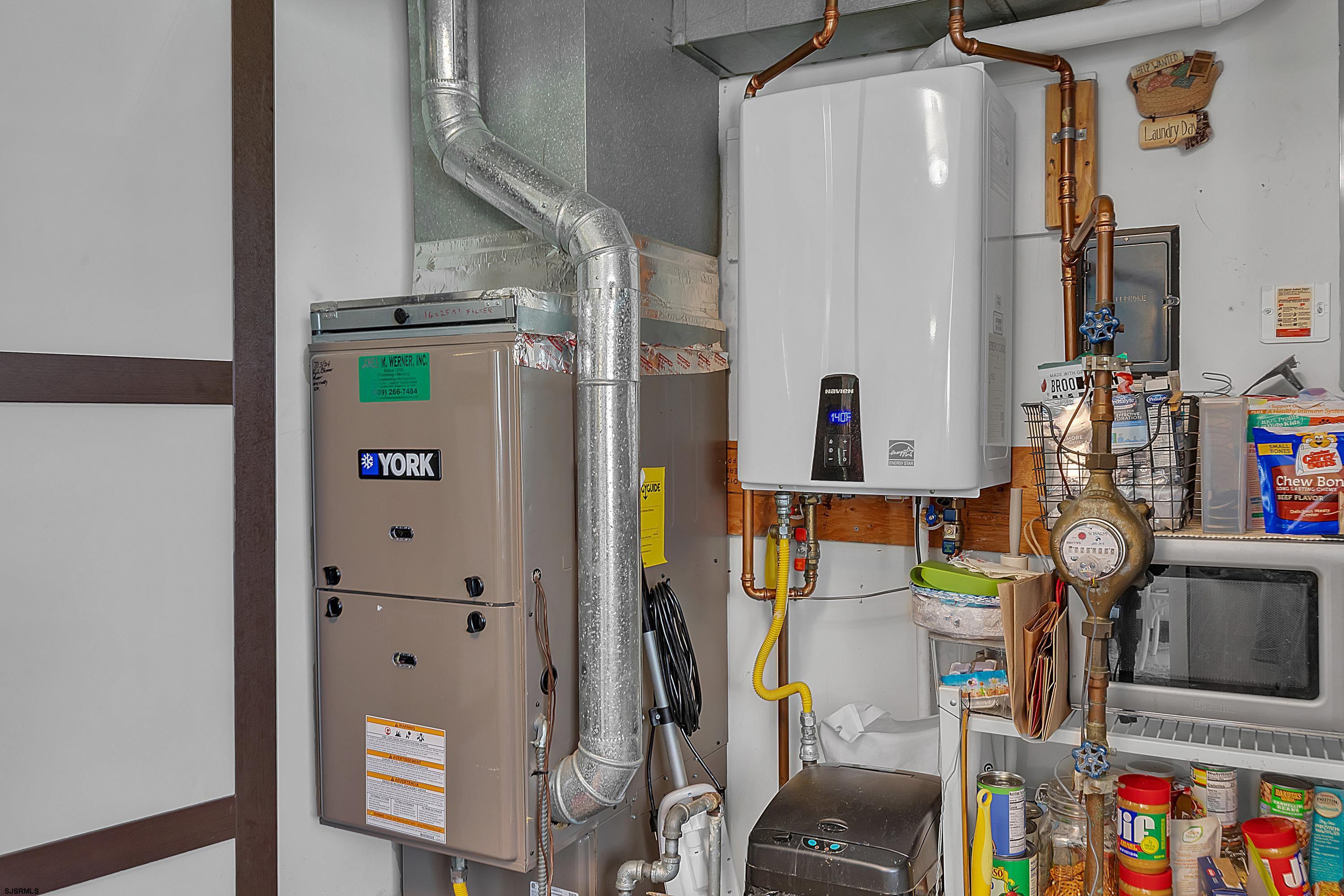 316 Gull Cove Brigantine, NJ 08203 - Photo 21 of 32 walk in closet with clothes and shoes