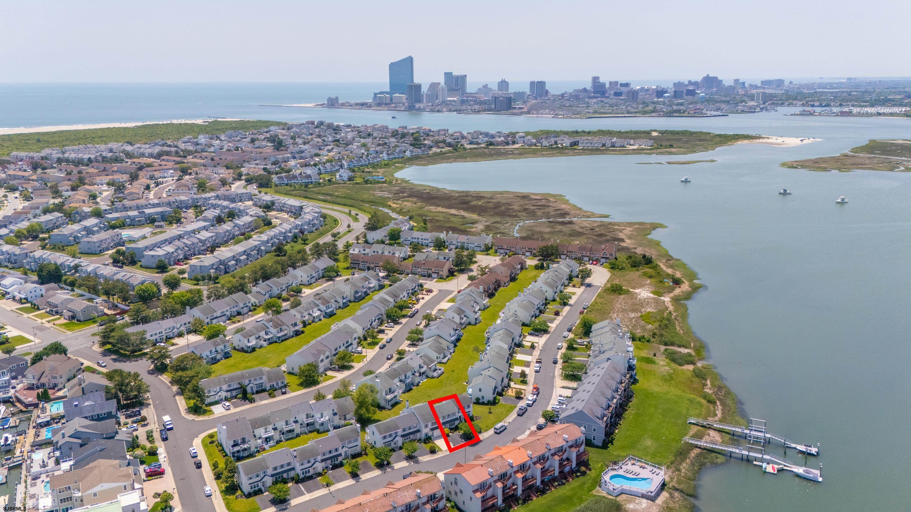 316 Gull Cove Brigantine, NJ 08203 - Photo 28 of 32 an aerial view of residential houses with outdoor space