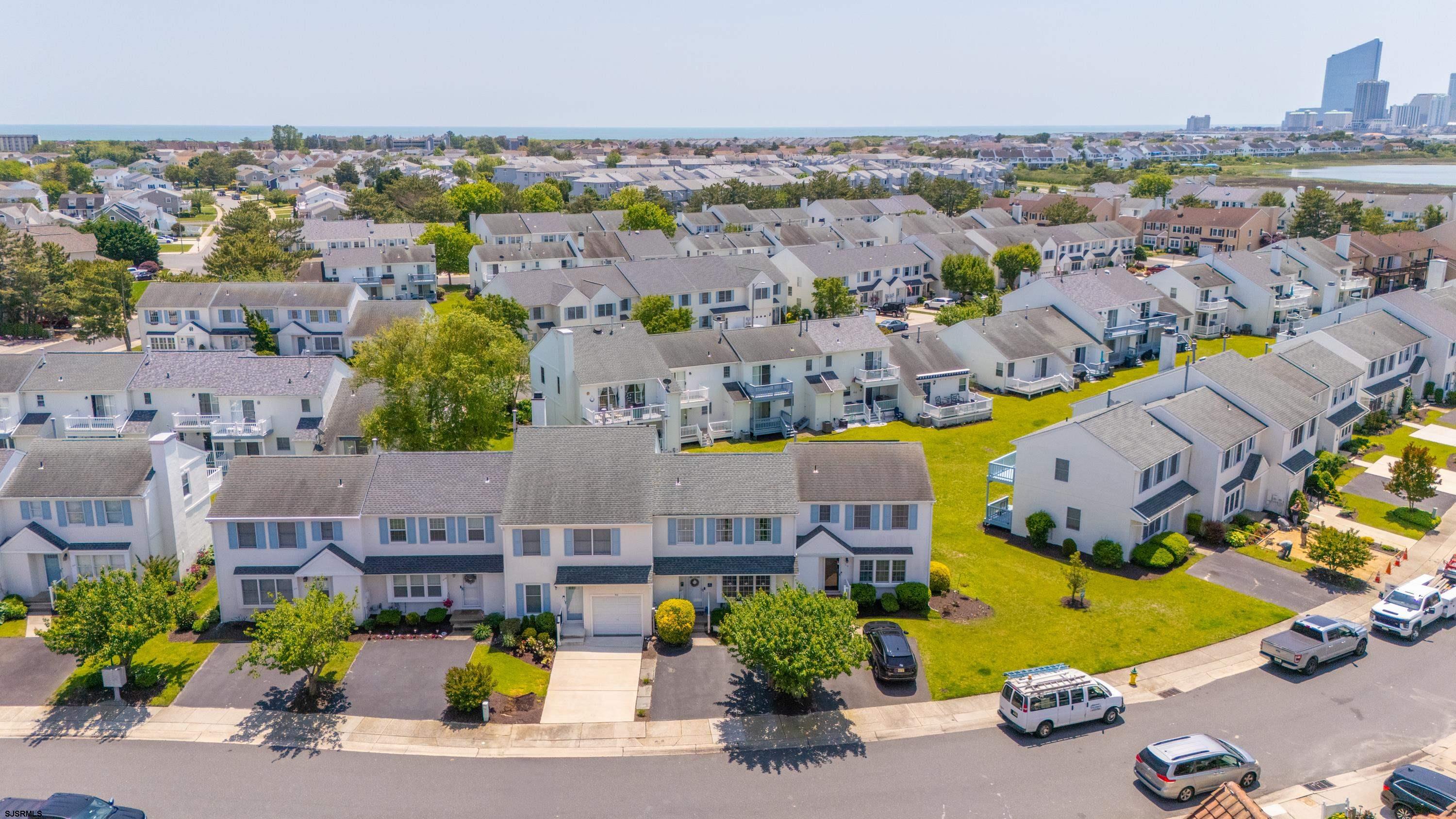 316 Gull Cove Brigantine, NJ 08203 - Photo 30 of 32 an aerial view of residential houses with outdoor space and parking