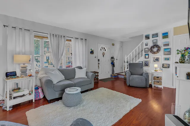 a living room with furniture and a couch