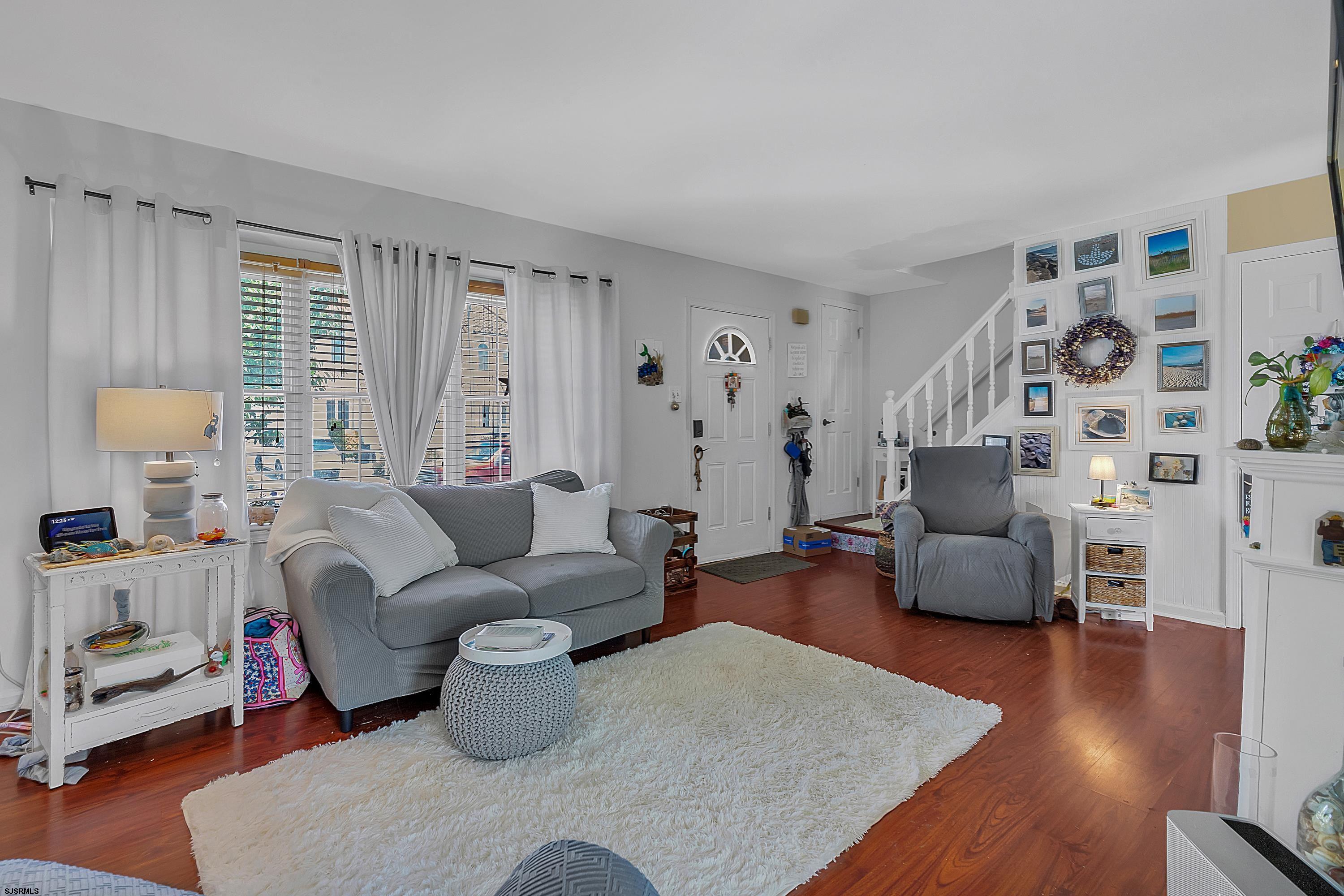 316 Gull Cove Brigantine, NJ 08203 - Photo 6 of 32 a living room with furniture and a couch