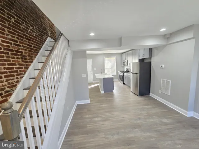 a view of a kitchen with a sink