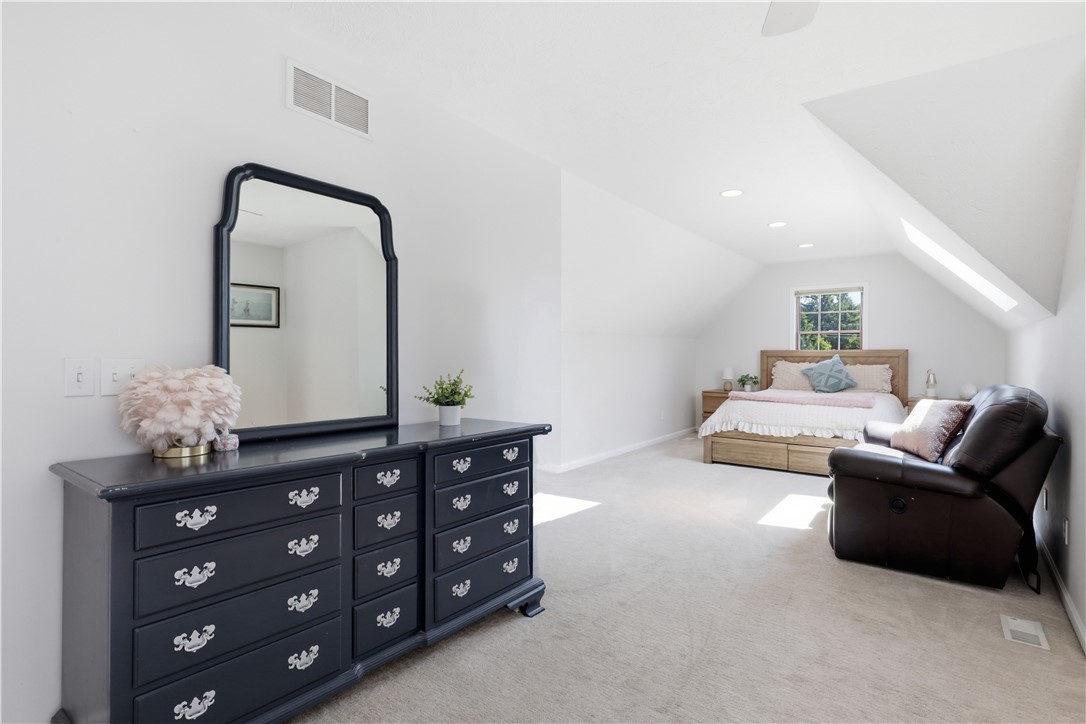 2057 Stirnie Road Victor, NY 14564 - Photo 25 of 48 This massive second-floor bedroom offers exceptional space and flexibility. Large window overlook the scenic grounds, while soft neutral carpeting and neutra tones.