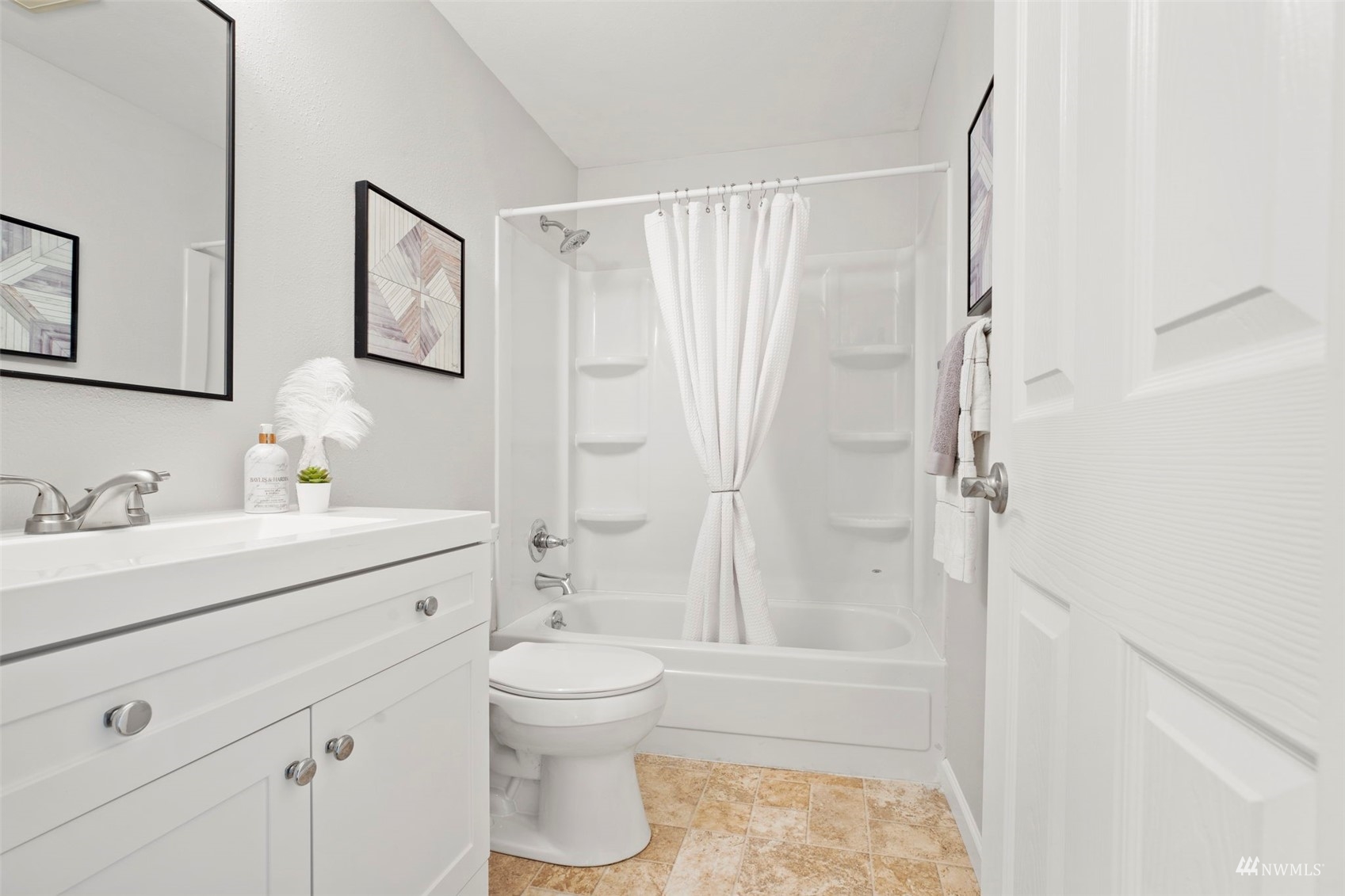 820 Cady Road, Unit F107 Everett, WA 98203 - Photo 17 of 33 a bathroom with a sink a toilet and shower