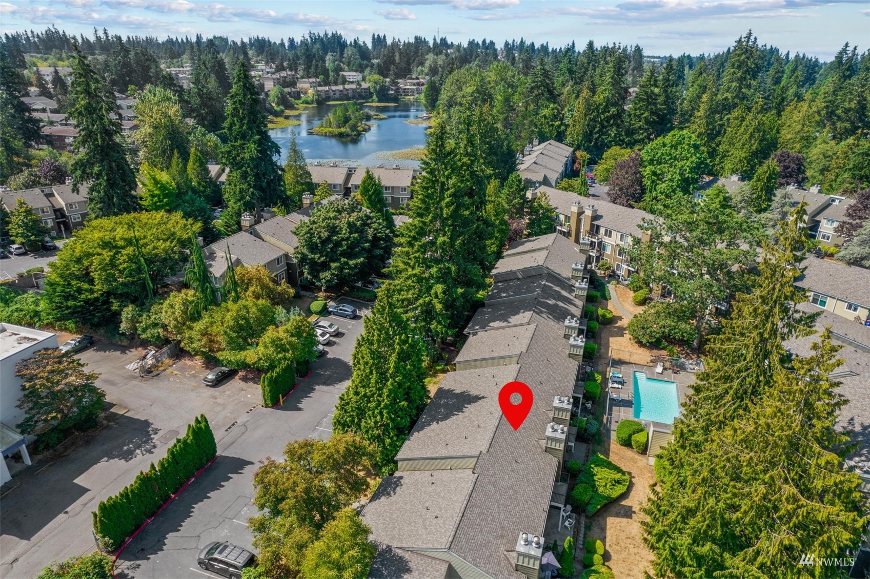820 Cady Road, Unit F107 Everett, WA 98203 - Photo 32 of 33 an aerial view of a house with a yard and lake view