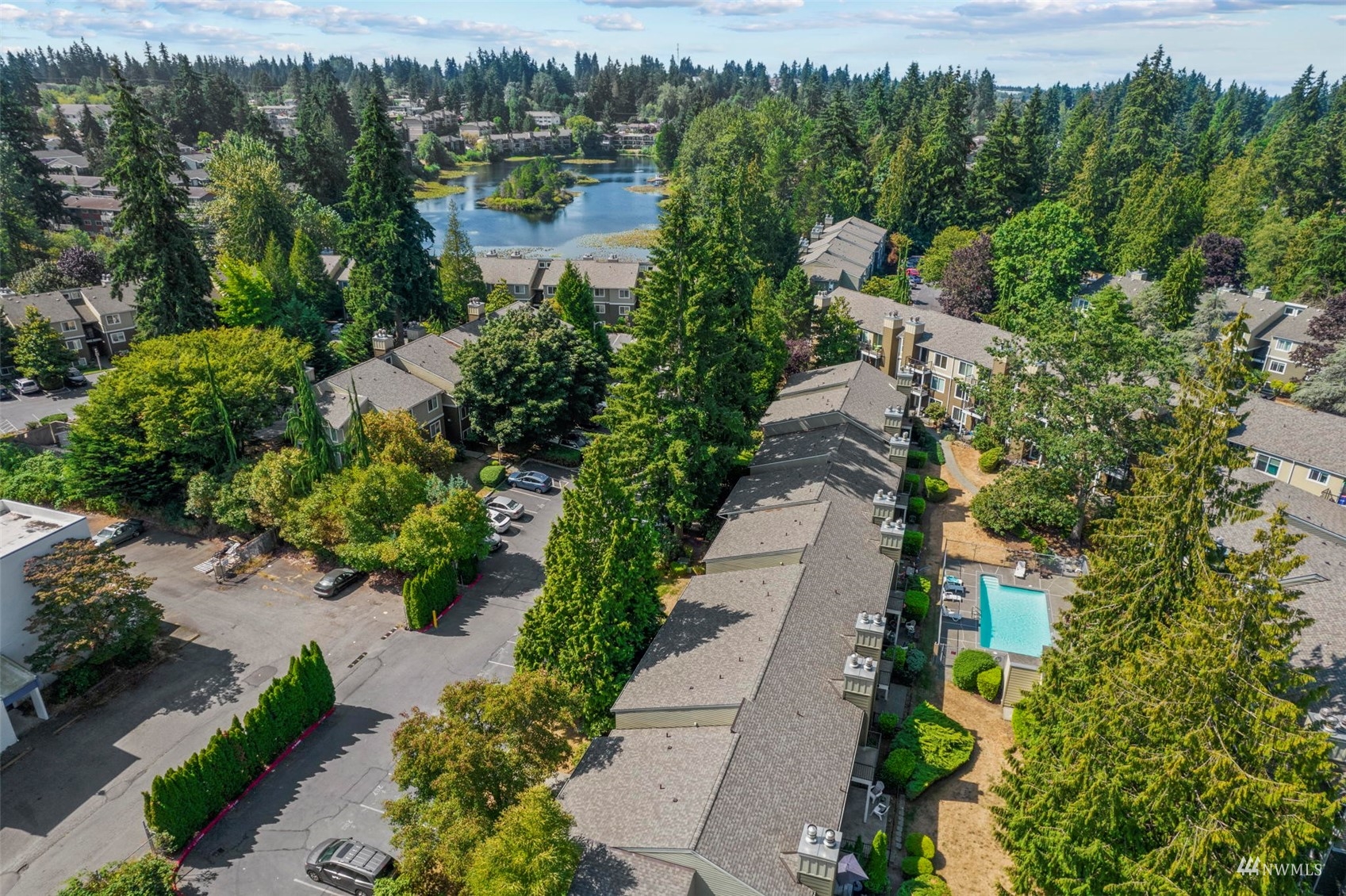 820 Cady Road, Unit F107 Everett, WA 98203 - Photo 33 of 33 a view of a lake with a building in the background