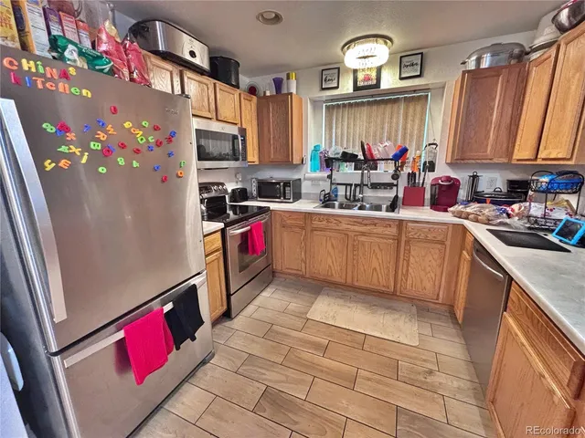 $342,000 | 18986 East 57th Place, Unit A, Denver, CO 80249