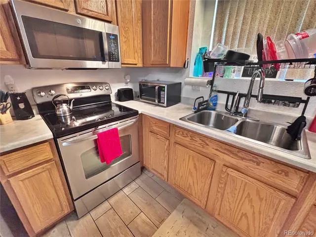 $342,000 | 18986 East 57th Place, Unit A, Denver, CO 80249