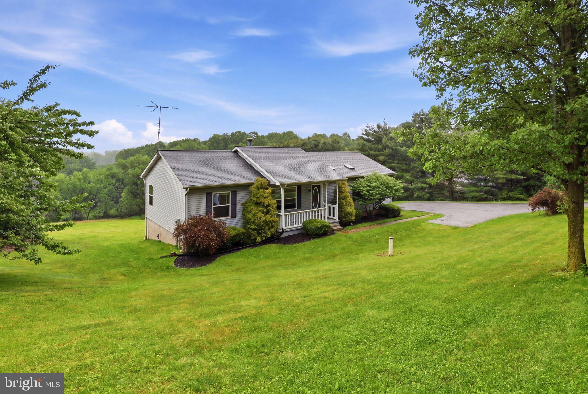 491 Garvine Mill Road Fawn Grove, PA 17321 - Photo 3 of 47 a view of a house with a big yard
