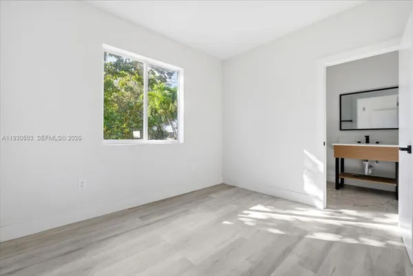 a view of a room with a window