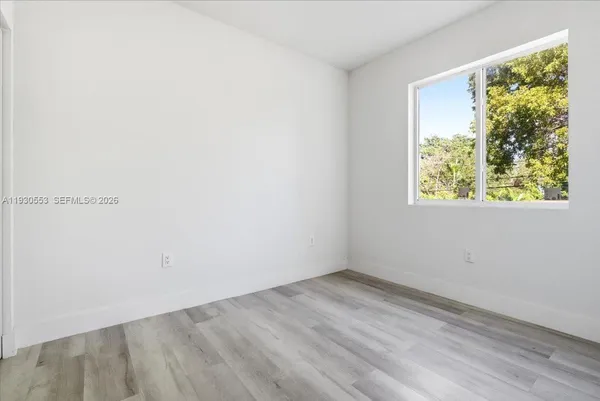 an empty room with a window