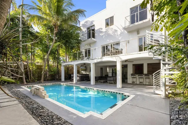 a view of a building with a swimming pool