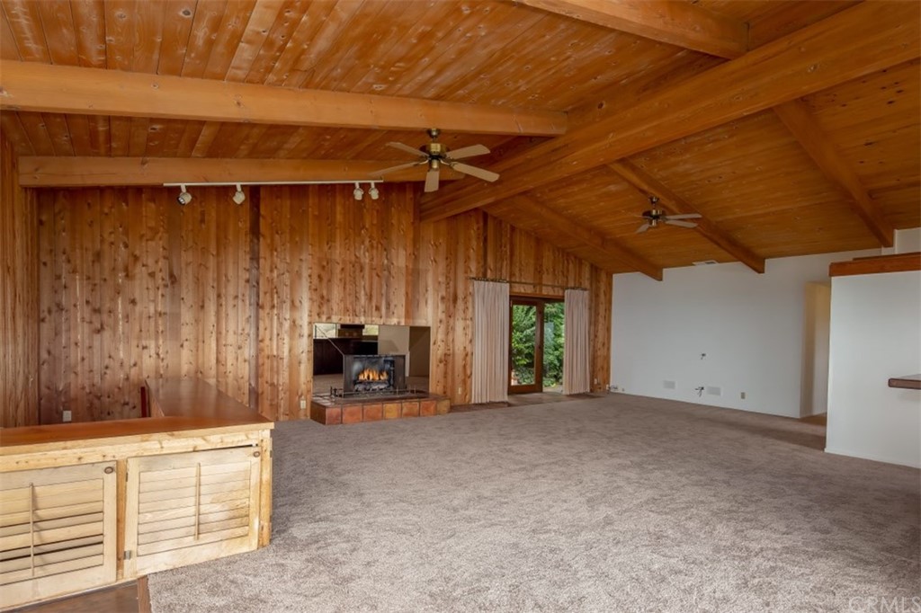 1844 Upper Rim Rock Road Laguna Beach, CA 92651 - Photo 14 of 38 a view of a room with furniture and a garage
