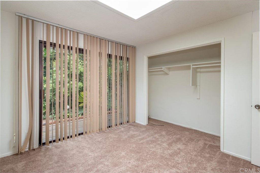 1844 Upper Rim Rock Road Laguna Beach, CA 92651 - Photo 19 of 38 an empty room with windows