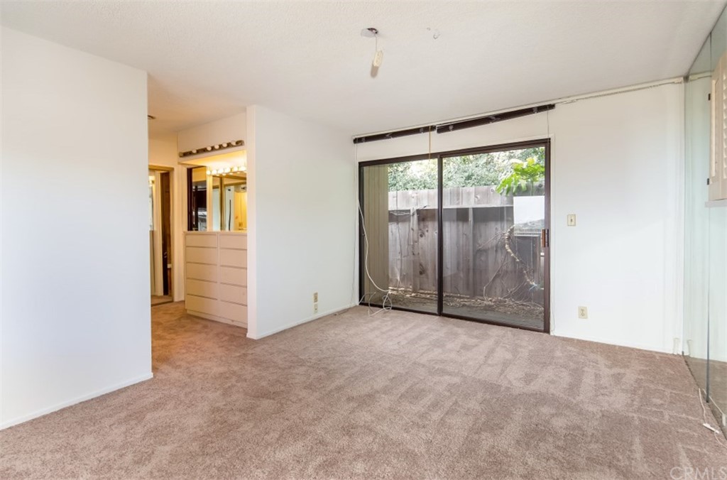 1844 Upper Rim Rock Road Laguna Beach, CA 92651 - Photo 21 of 38 an empty room with windows and closet