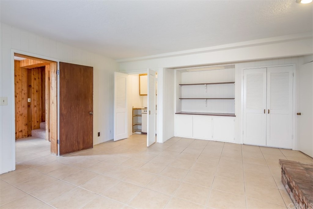 1844 Upper Rim Rock Road Laguna Beach, CA 92651 - Photo 30 of 38 an empty room with closet and closet