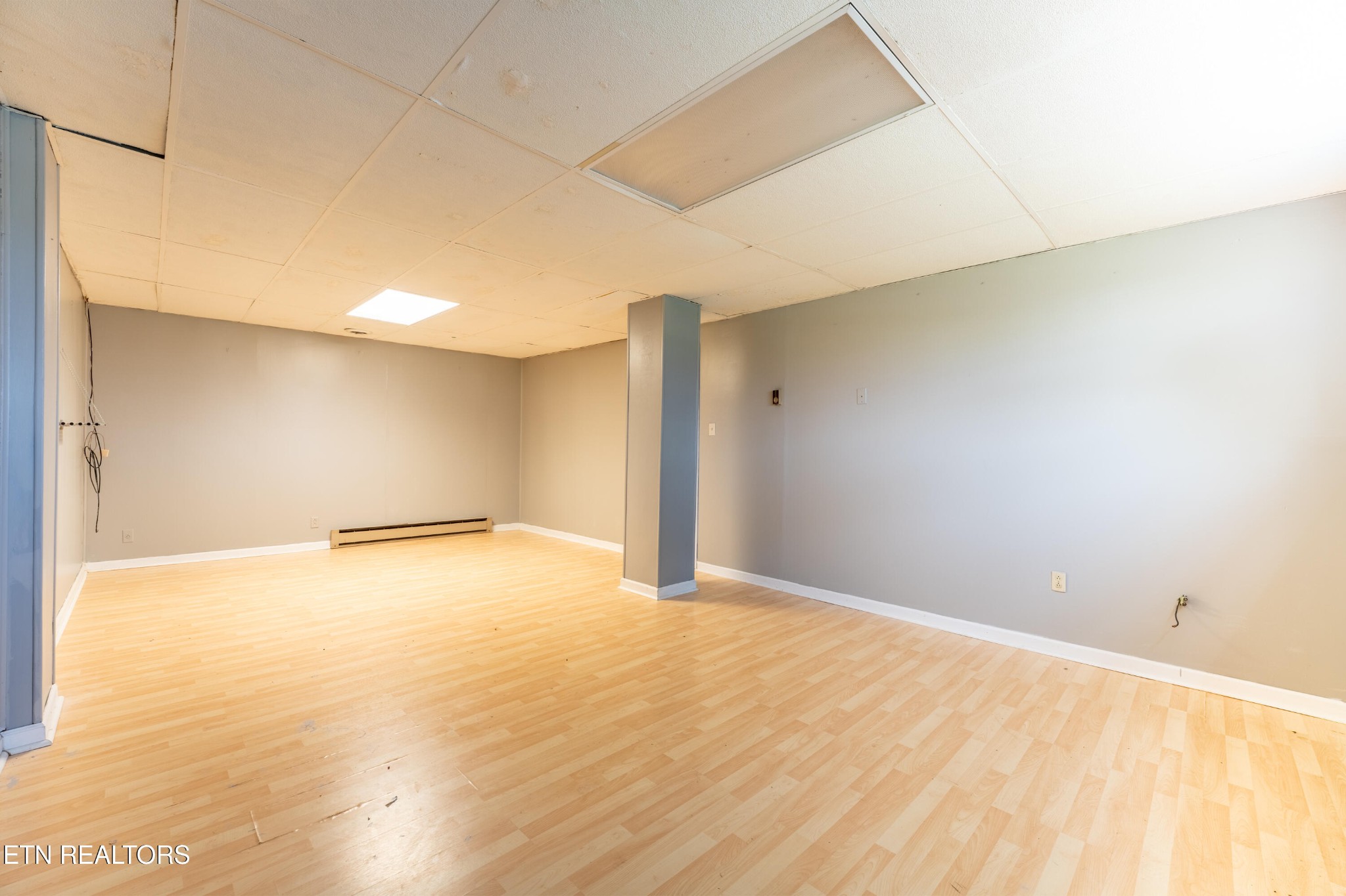 7725 Cranley Road Powell, TN 37849 - Photo 21 of 43 a view of an empty room with wooden floor