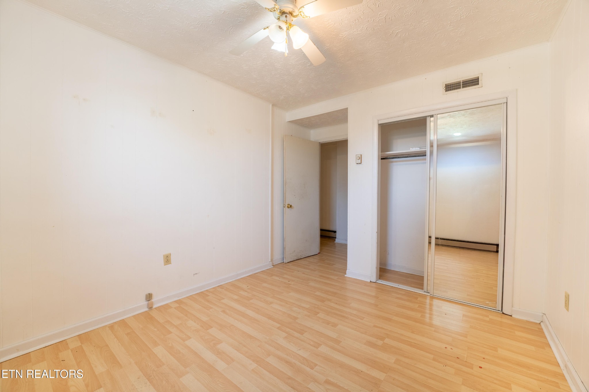 7725 Cranley Road Powell, TN 37849 - Photo 24 of 43 wooden floor in an empty room