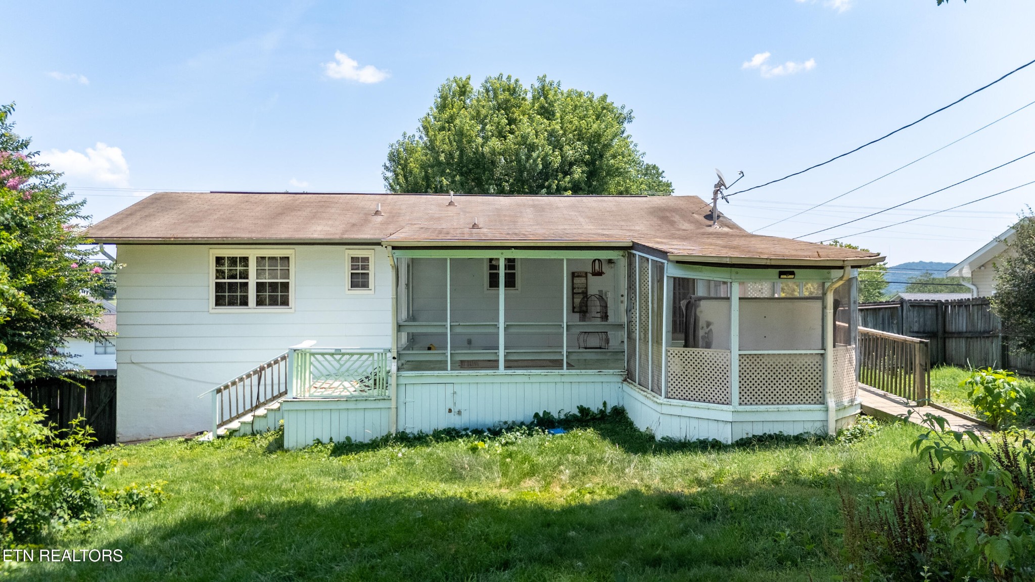 7725 Cranley Road Powell, TN 37849 - Photo 29 of 43 a view of a house with a yard porch and sitting area