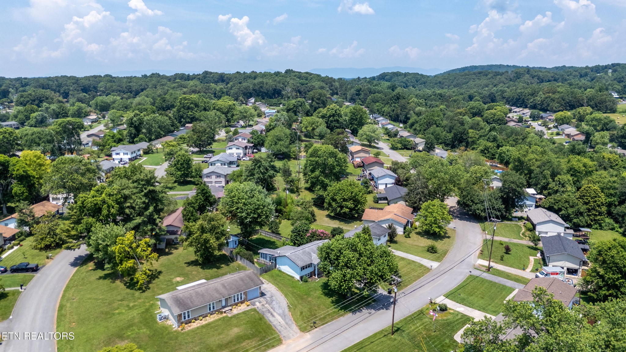 7725 Cranley Road Powell, TN 37849 - Photo 34 of 43 an aerial view of residential houses with outdoor space and swimming pool