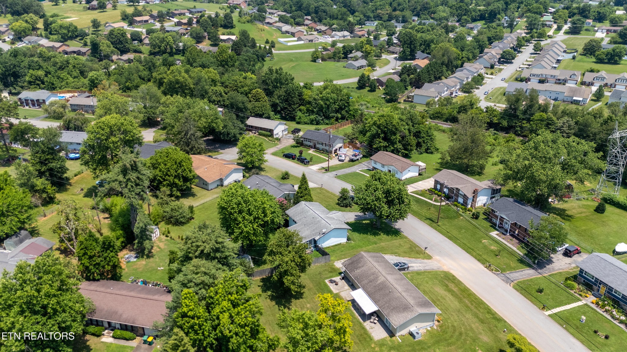 7725 Cranley Road Powell, TN 37849 - Photo 41 of 43 an aerial view of residential houses with outdoor space and trees