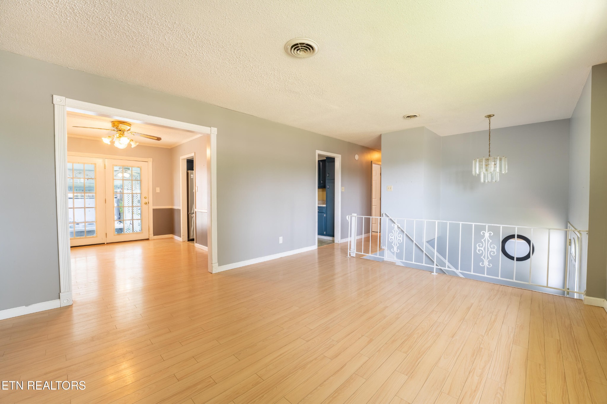 7725 Cranley Road Powell, TN 37849 - Photo 5 of 43 a view of an empty room with glass door