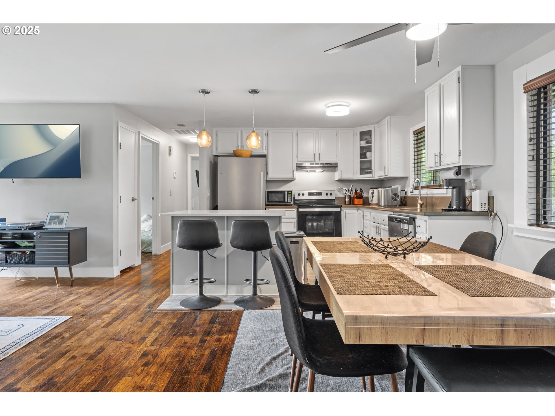 1245 Southeast 211th Avenue Gresham, OR 97030 - Photo 13 of 36 a view of a dining room with furniture