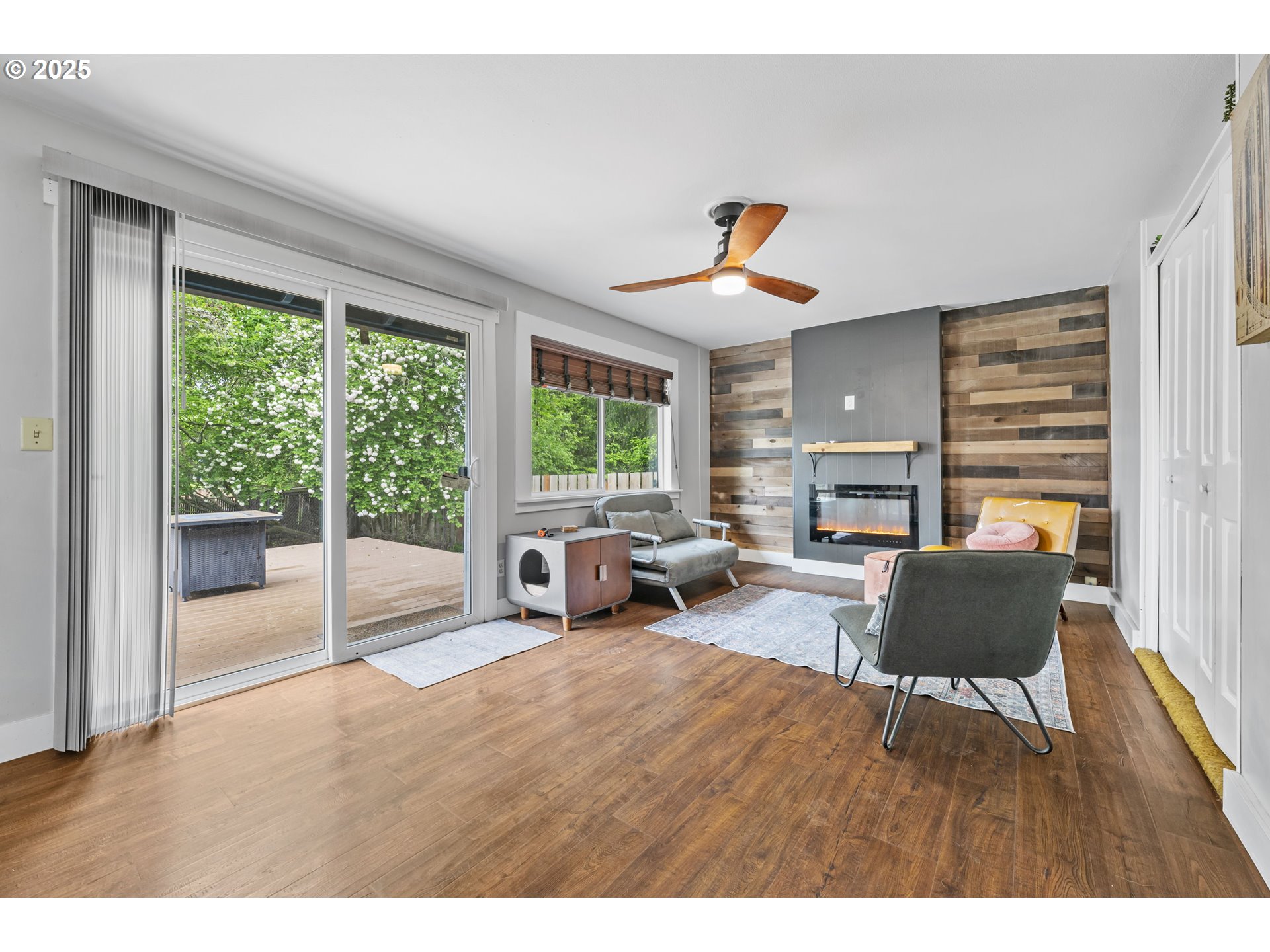 1245 Southeast 211th Avenue Gresham, OR 97030 - Photo 18 of 36 a living room with furniture and a fireplace
