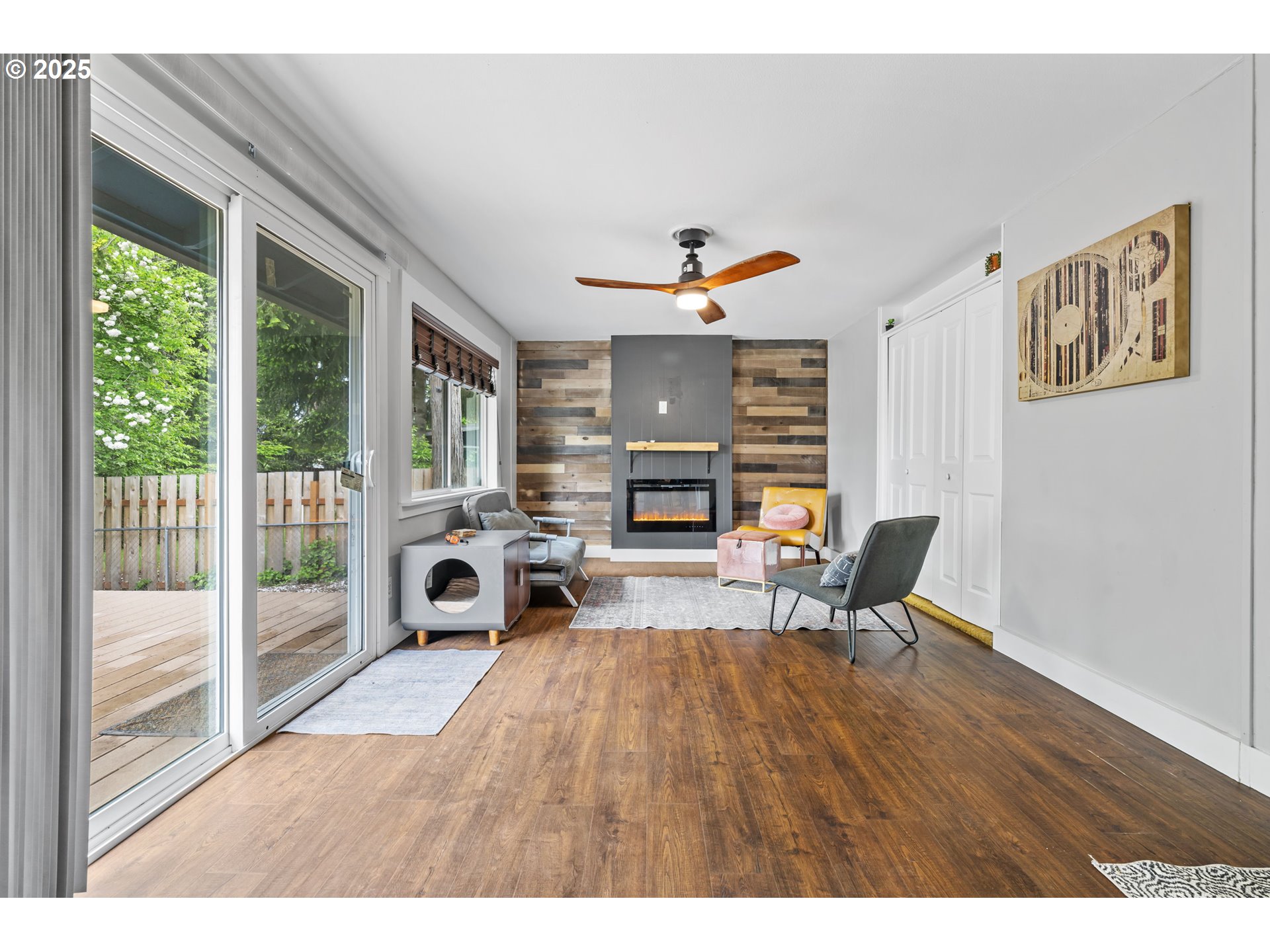 1245 Southeast 211th Avenue Gresham, OR 97030 - Photo 19 of 36 a living room with furniture and a fireplace