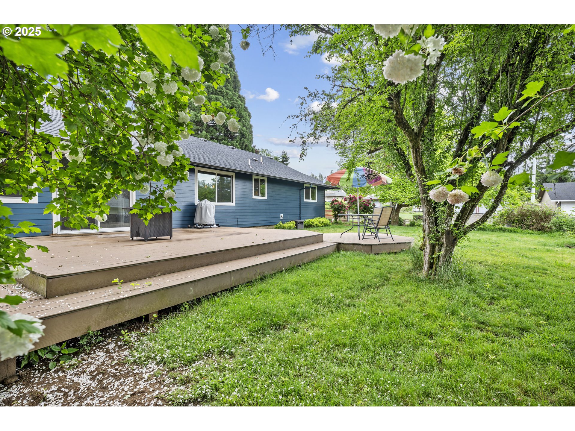 1245 Southeast 211th Avenue Gresham, OR 97030 - Photo 32 of 36 a house view with a garden space