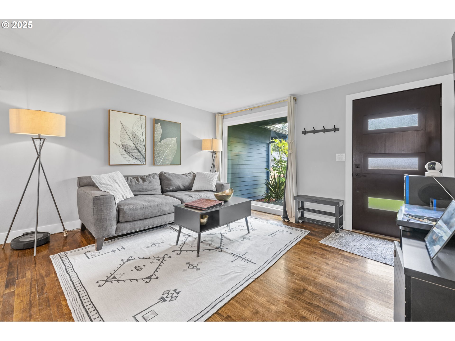 1245 Southeast 211th Avenue Gresham, OR 97030 - Photo 6 of 36 a living room with furniture and a wooden floor