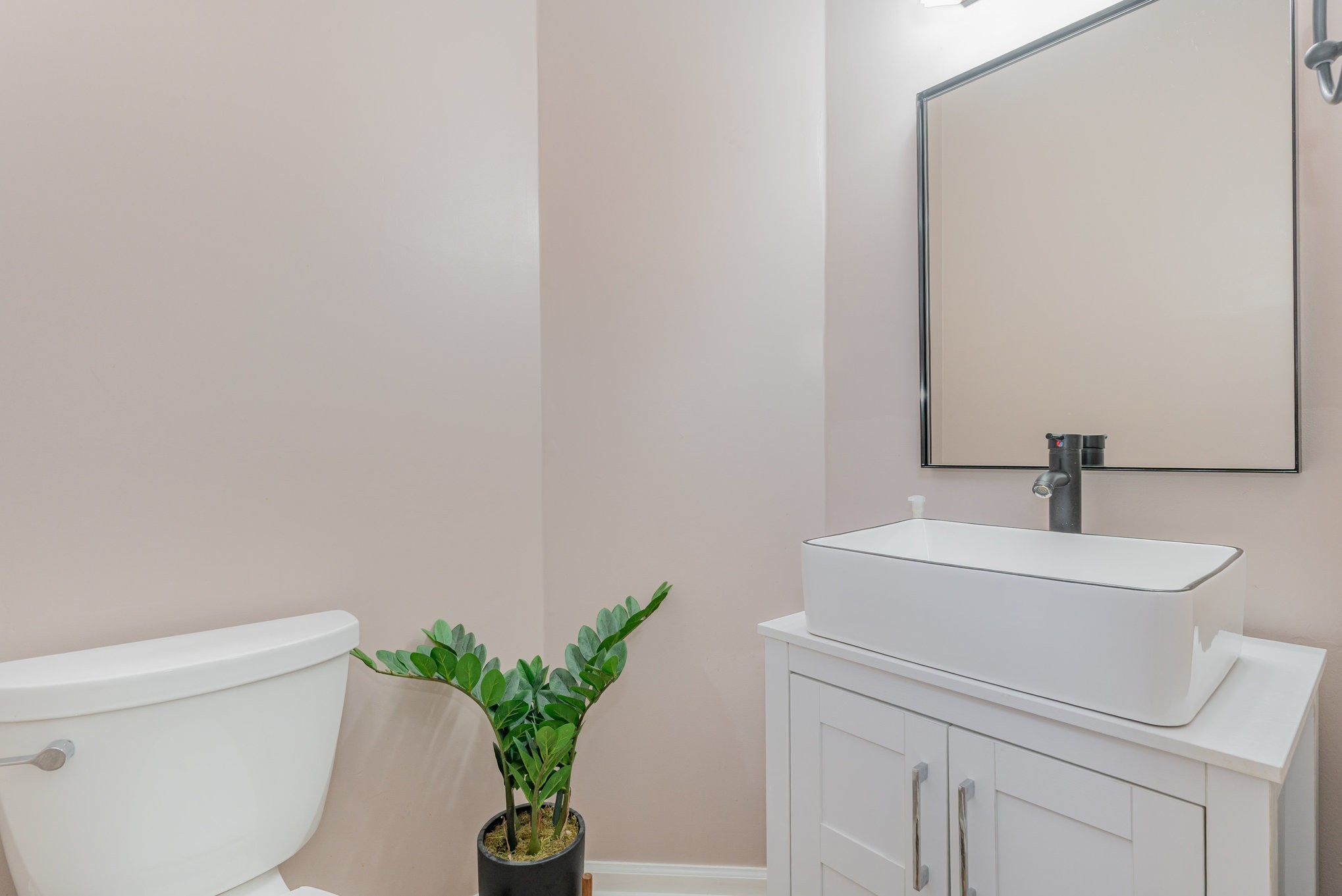 2822 Apache Moon Terrace Murfreesboro, TN 37127 - Photo 11 of 31 a bathroom with a toilet a sink and a mirror