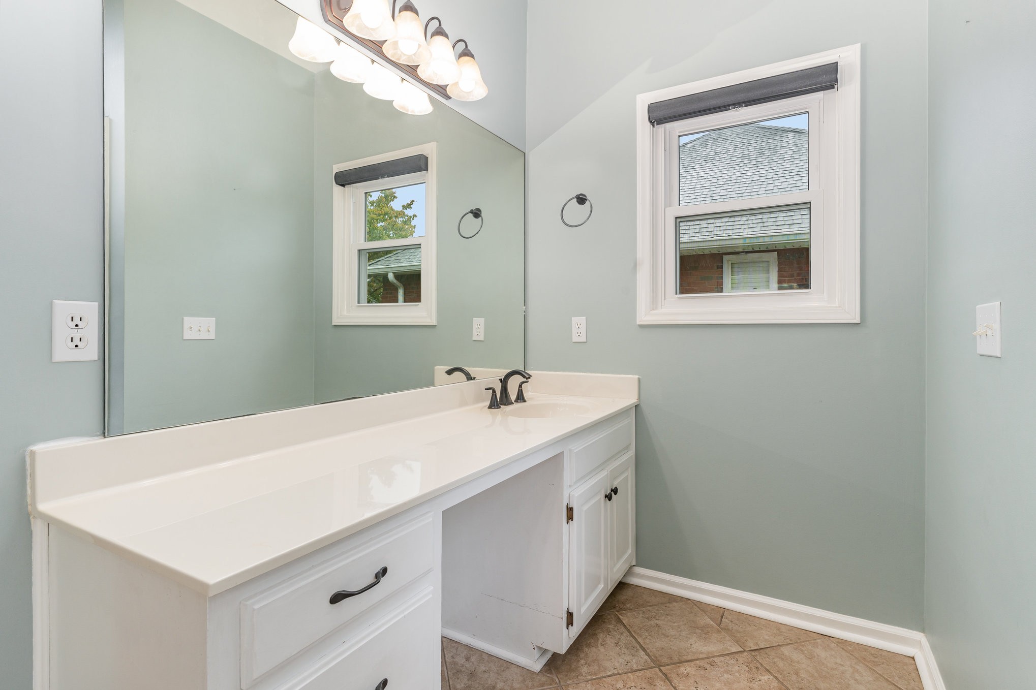 2822 Apache Moon Terrace Murfreesboro, TN 37127 - Photo 16 of 31 a bathroom with a sink and a mirror