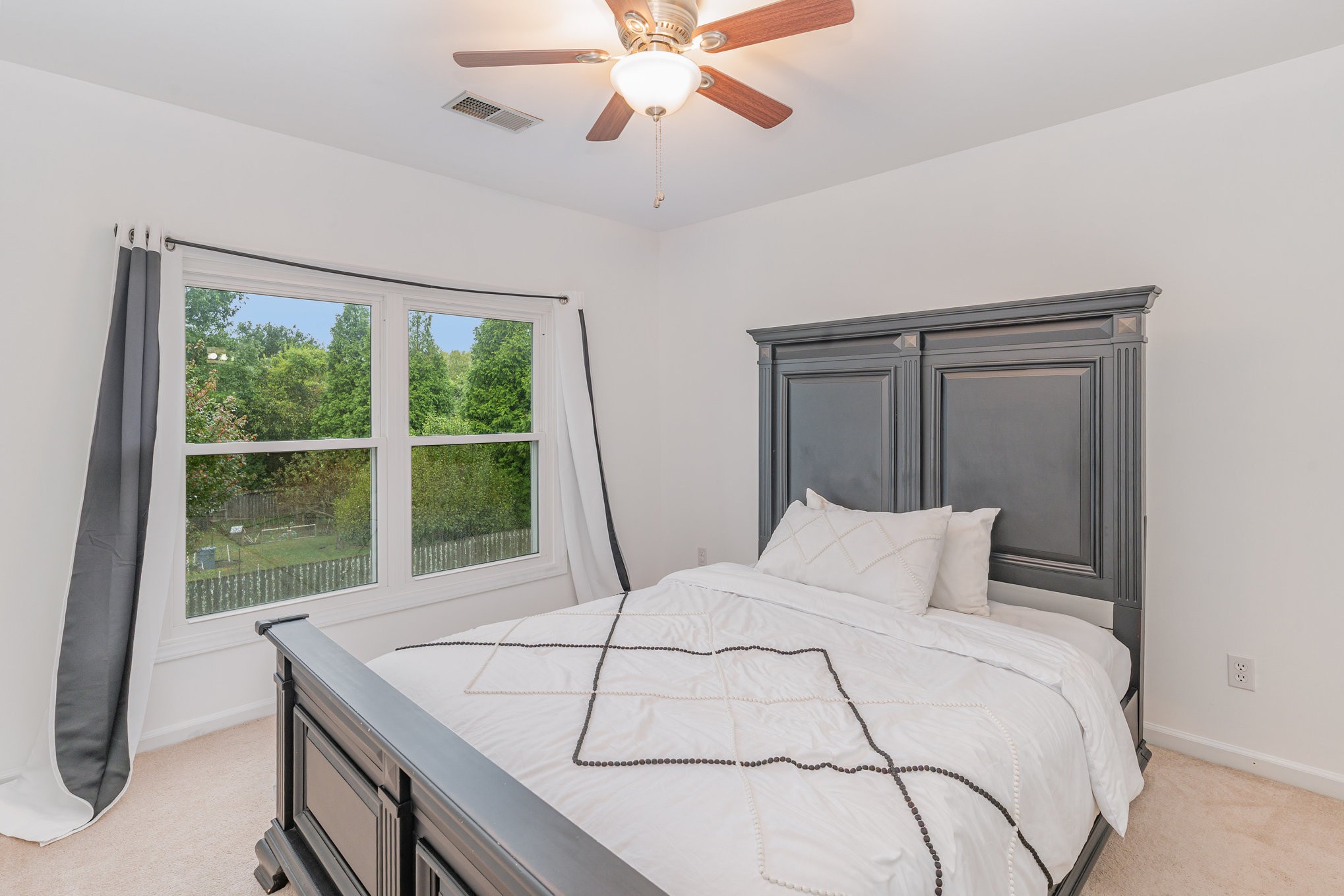 2822 Apache Moon Terrace Murfreesboro, TN 37127 - Photo 19 of 31 a bedroom with a large bed and a large window