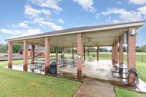 a view of a golf course with a lake
