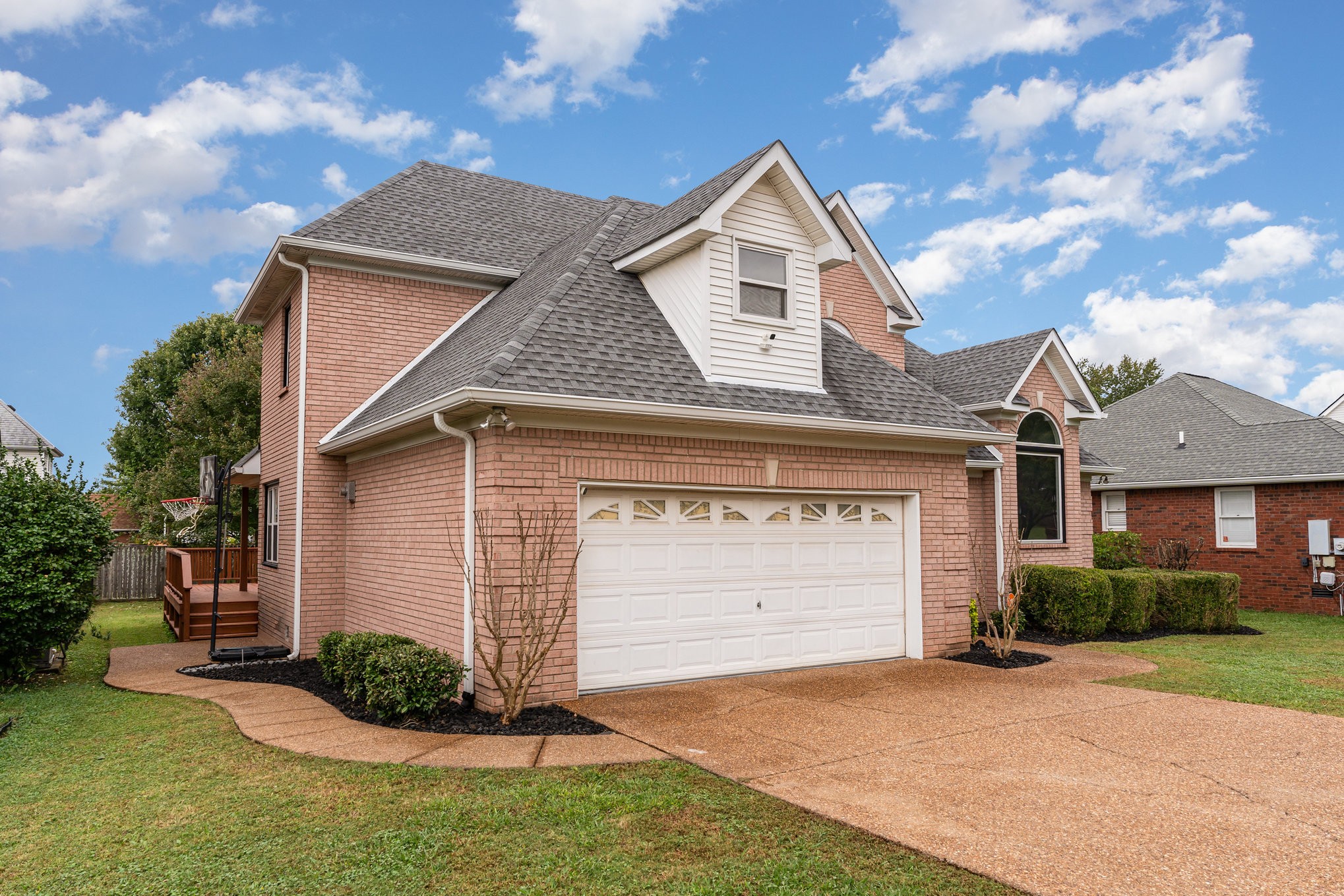 2822 Apache Moon Terrace Murfreesboro, TN 37127 - Photo 3 of 31 a front view of a house with a yard and garage