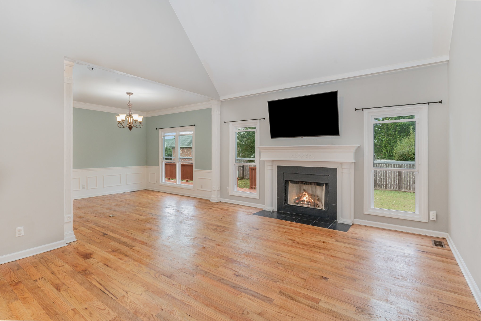 2822 Apache Moon Terrace Murfreesboro, TN 37127 - Photo 6 of 31 a view of a livingroom with a fireplace wooden floor and window