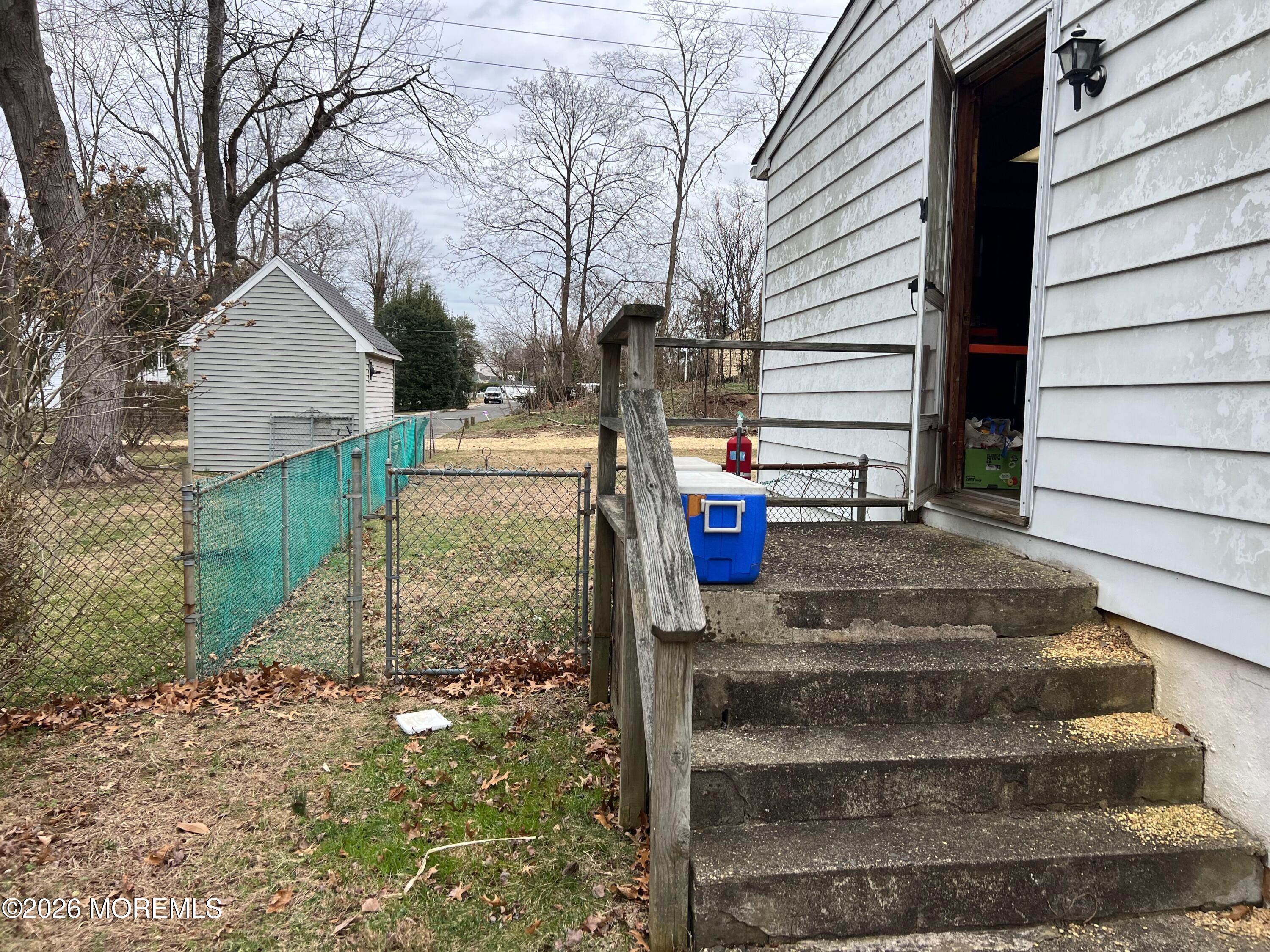 571 Hopping Road Belford, NJ 07718 - Photo 13 of 29 Side door off Kitchen