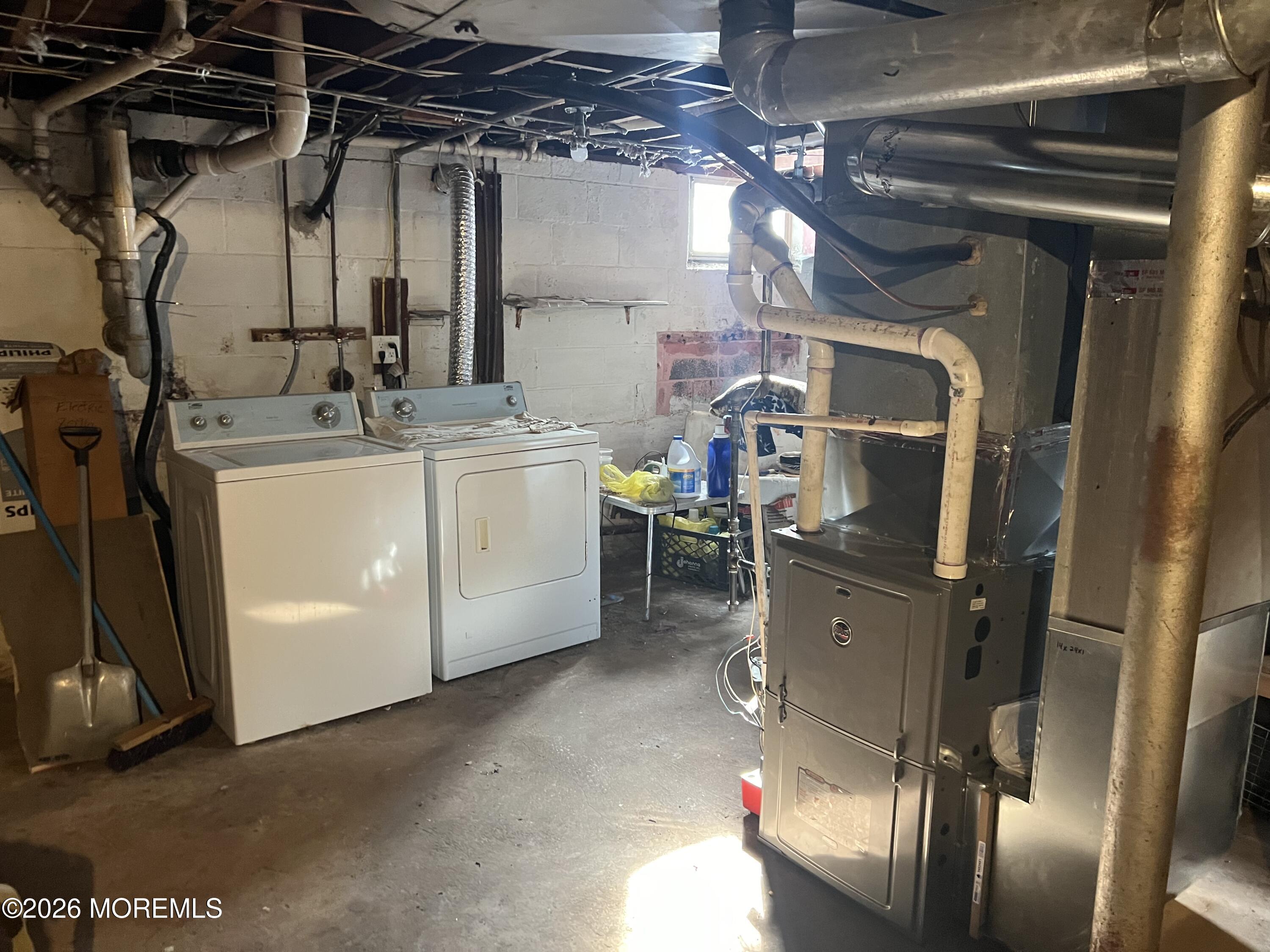 571 Hopping Road Belford, NJ 07718 - Photo 18 of 29 a utility room with dryer and washer