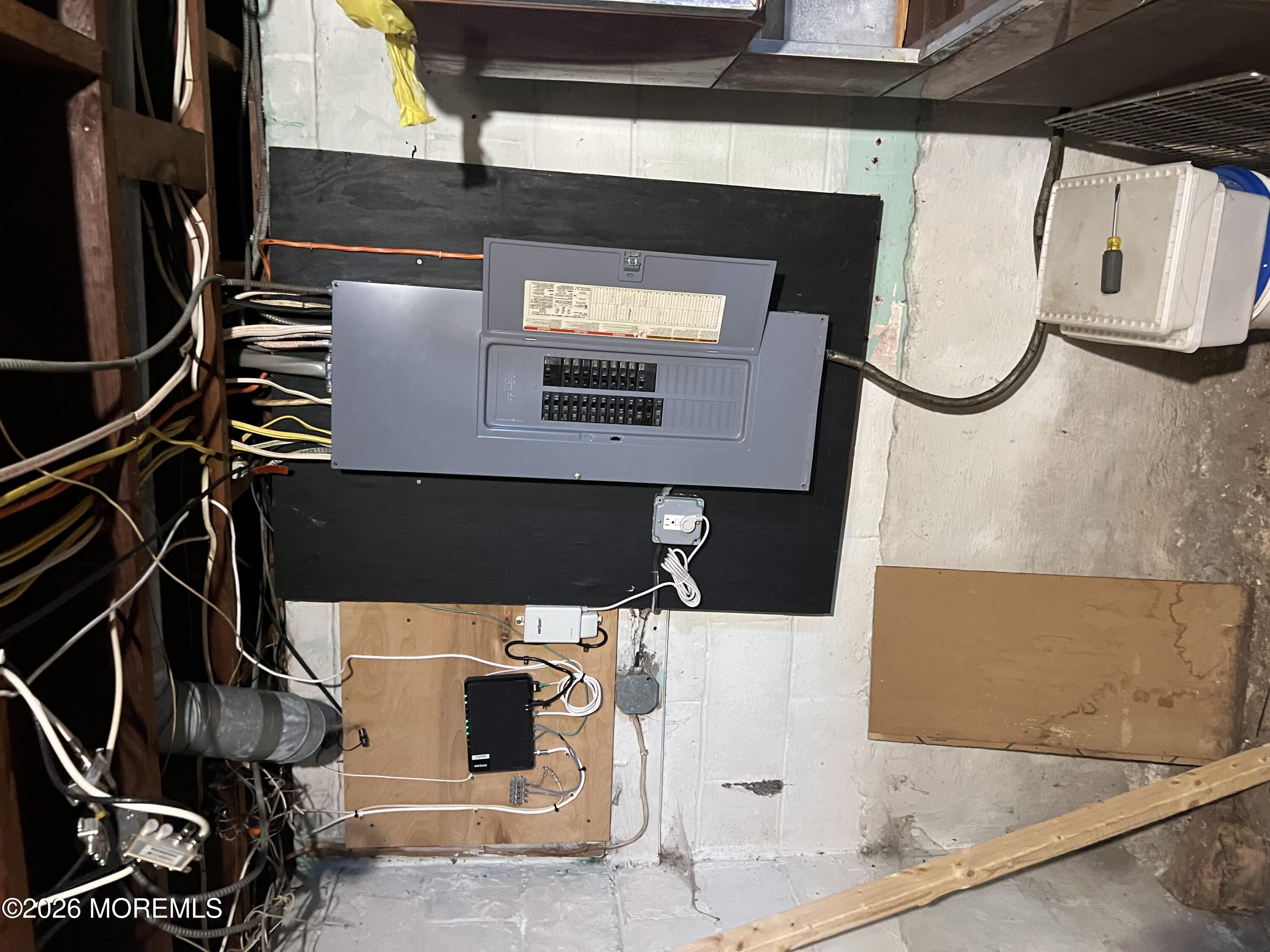 571 Hopping Road Belford, NJ 07718 - Photo 21 of 29 a bathroom with a sink and mirror