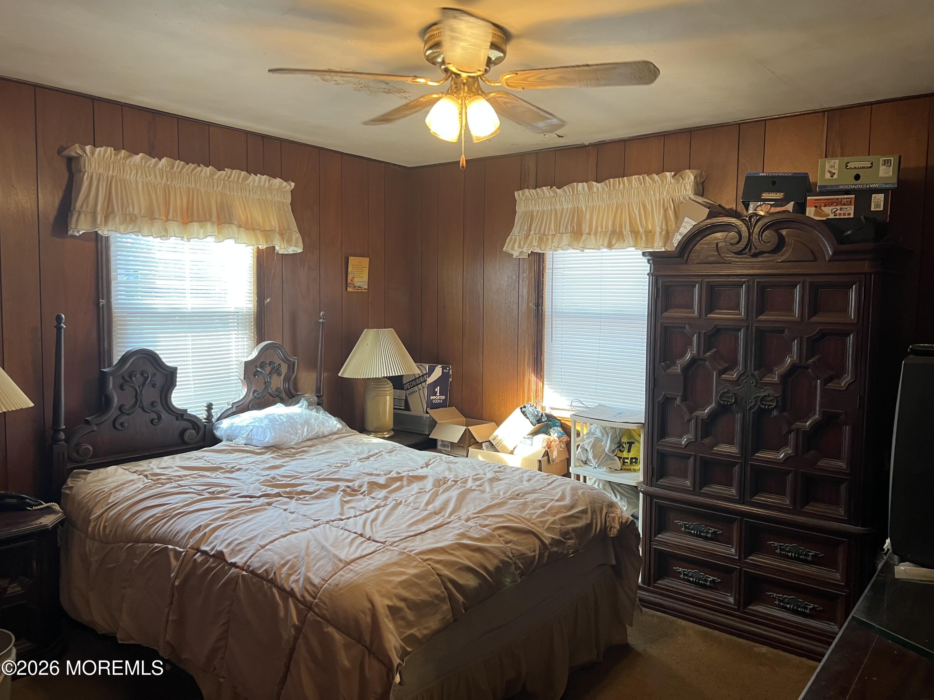 571 Hopping Road Belford, NJ 07718 - Photo 27 of 29 a bedroom with a bed and a window