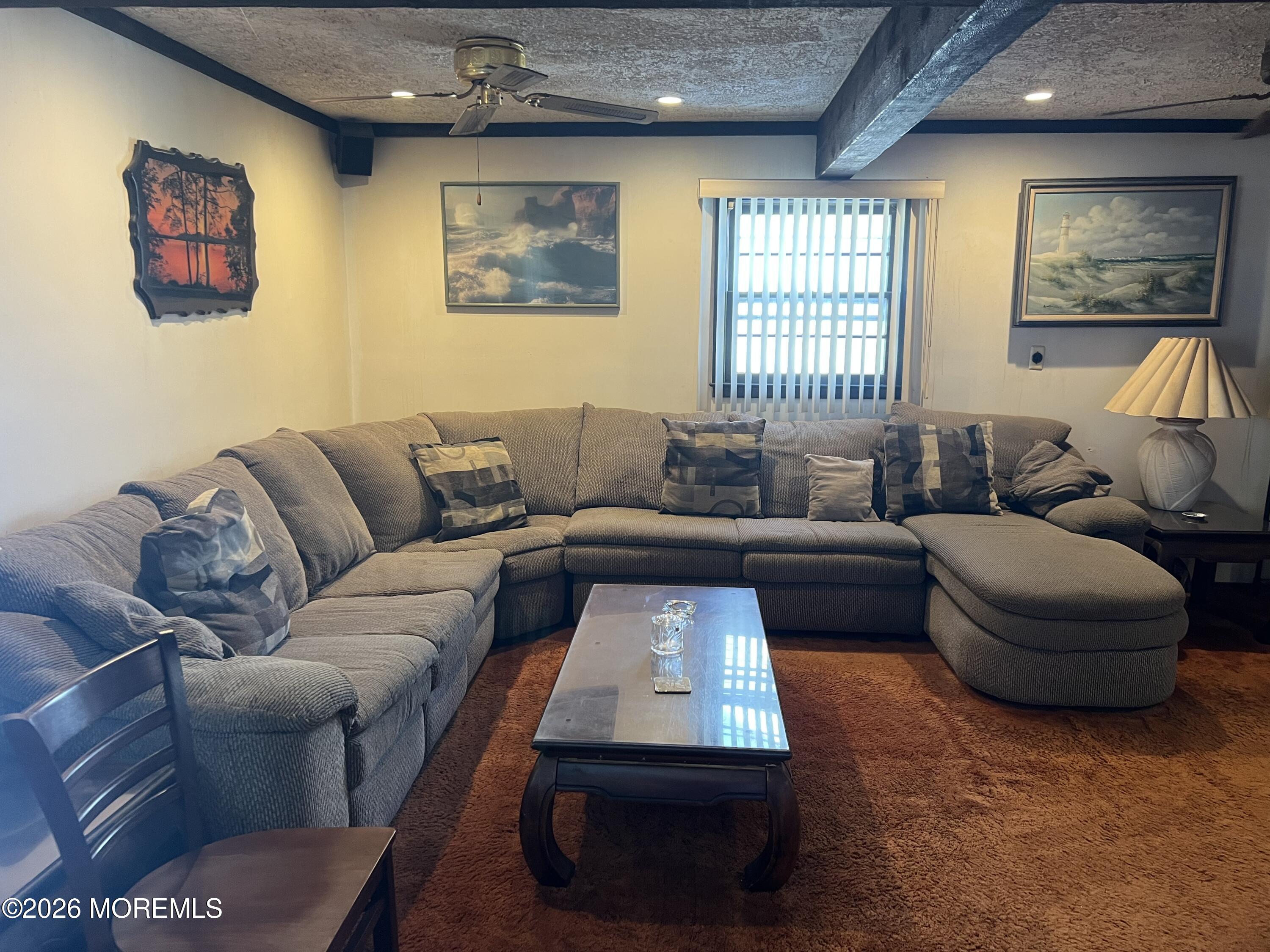 571 Hopping Road Belford, NJ 07718 - Photo 3 of 29 a living room with furniture and a large window