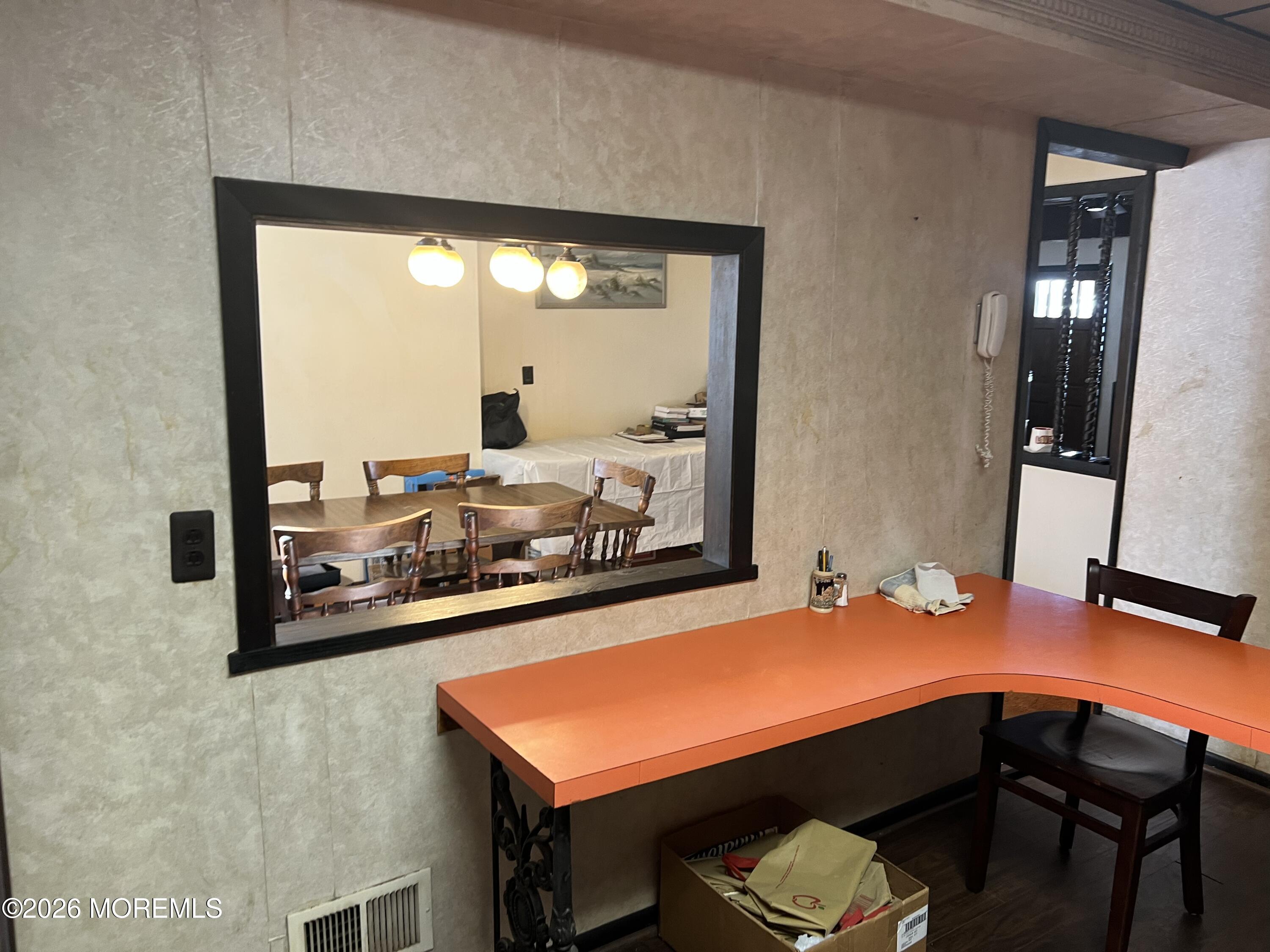 571 Hopping Road Belford, NJ 07718 - Photo 5 of 29 a room with furniture and wooden floor