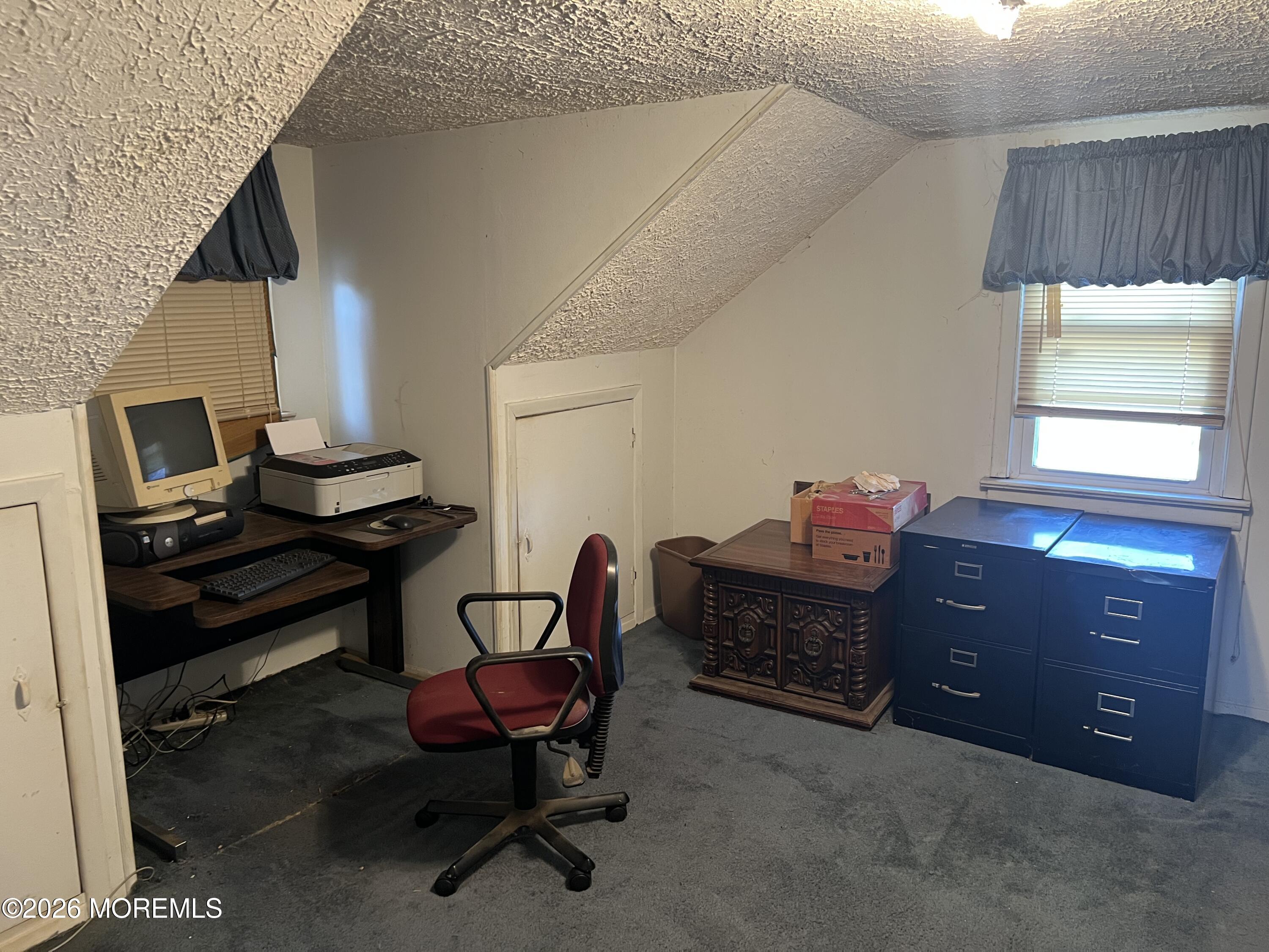 571 Hopping Road Belford, NJ 07718 - Photo 10 of 29 a room with furniture and window