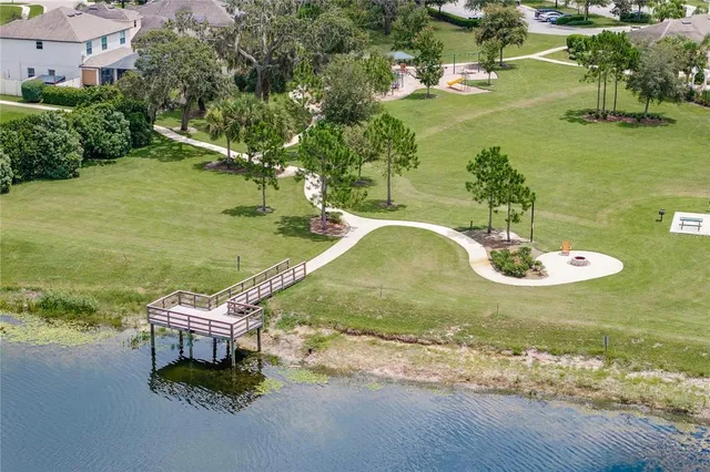 a swimming pool with wooden fence